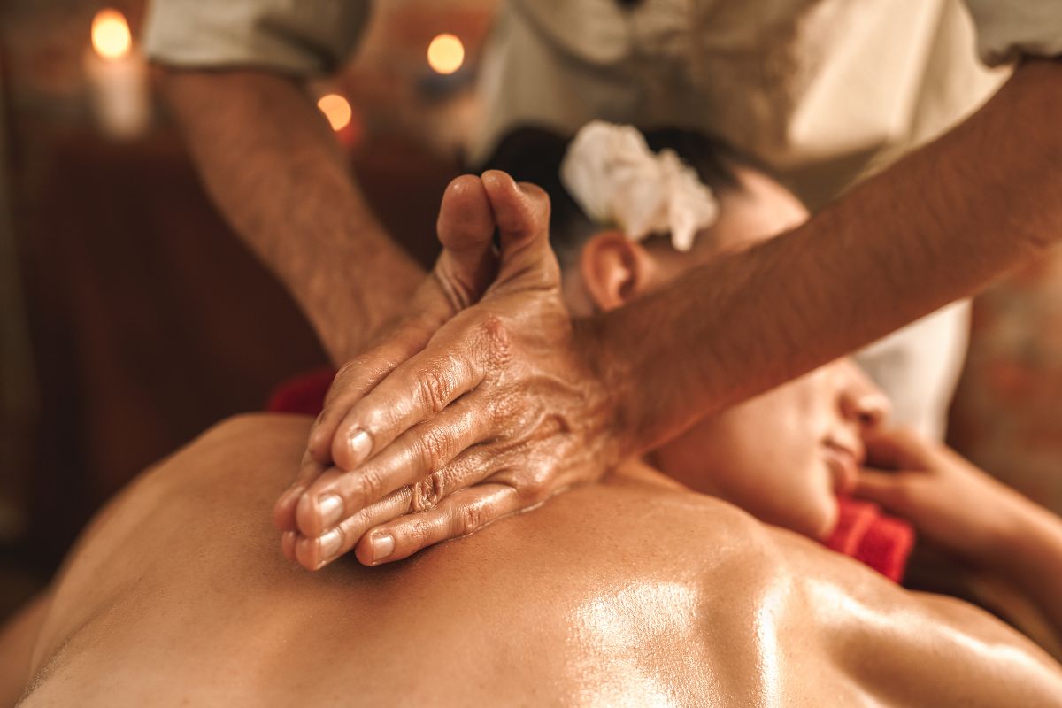 a person doing ayurvedic massage