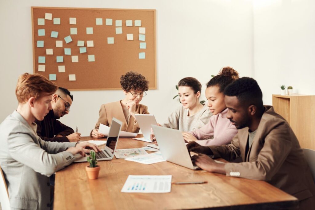 group of people having ai training to keep your job
