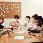 group of people having ai training to keep your job