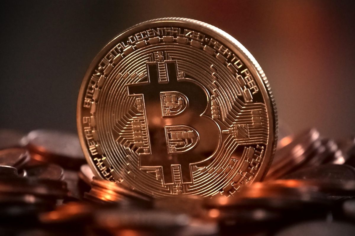 a vertically placed bitcoin among others representing psp gateway global reach