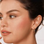a girl showing how to wear red blush